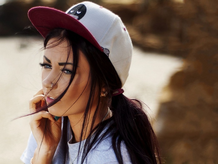 Danielle Mansutti wearing a hat and nose ring