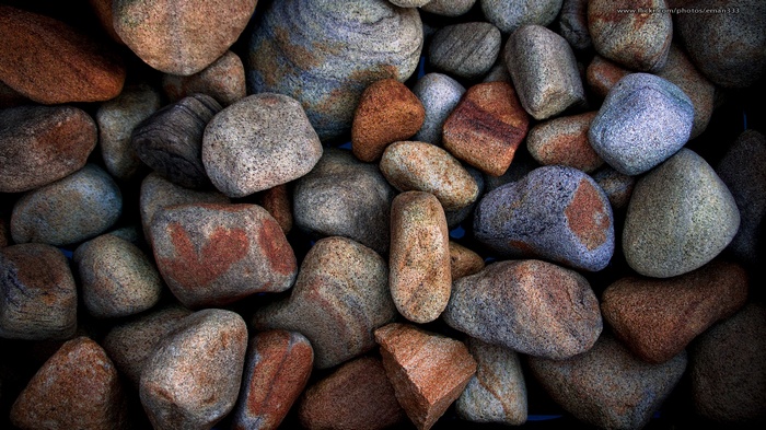 Close-up of colorful, textured river stones