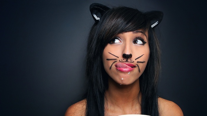 Woman with cat makeup and ears