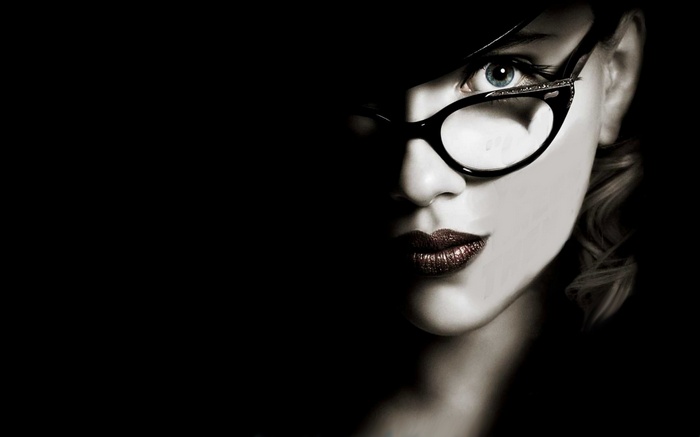 Scarlett Johansson wearing glasses and a hat