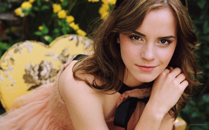 Emma Watson looking at viewer with a smile