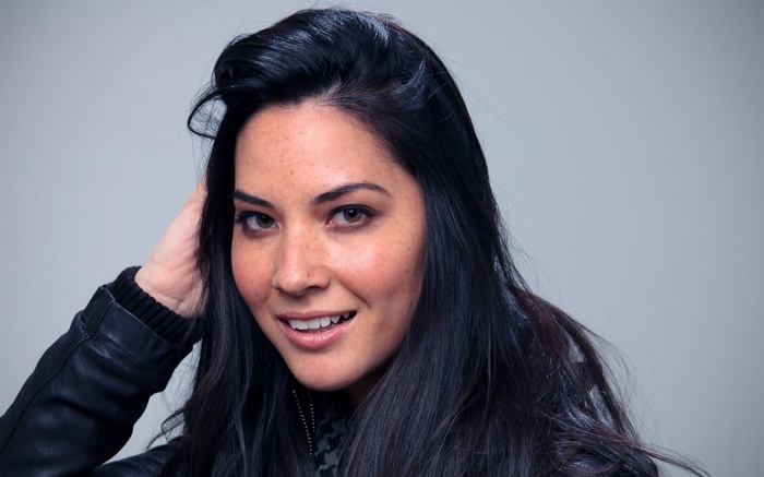 Olivia Munn portrait with hand in hair