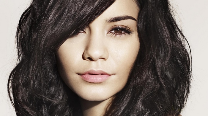 Vanessa Hudgens portrait with dark wavy hair