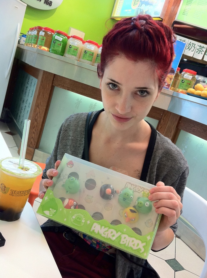 Susan Coffey holding Angry Birds toy set