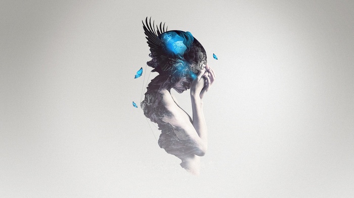 Fantasy girl with blue butterflies and bird wings
