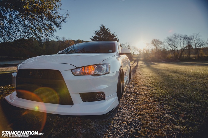 White Mitsubishi Lancer Evo X with Work Emotion XD-9 wheels