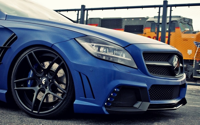 Blue Mercedes-Benz CLS with custom wheels