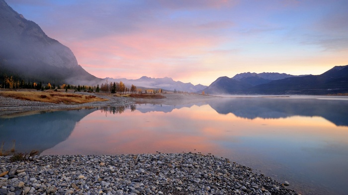 Abraham Lake, Canada: Mountains and lake at sunrise