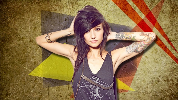 Valerie Poxleitner with tattoos and long hair