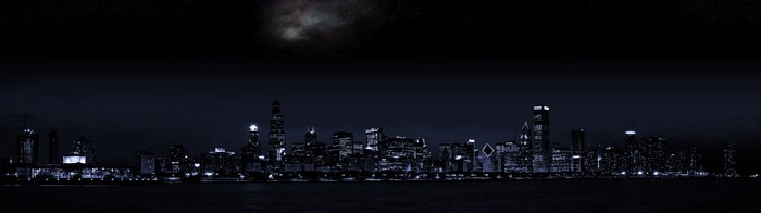 Dark cityscape at night with city lights