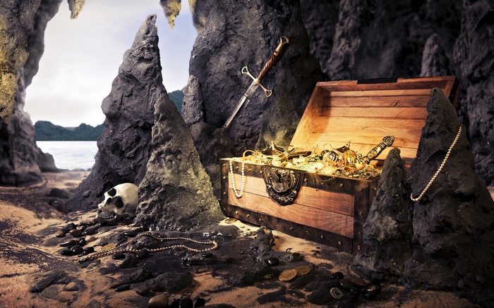 Pirate treasure chest with skull and sword in a cave