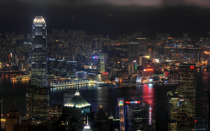 Hong Kong cityscape at night with illuminated skyscrapers