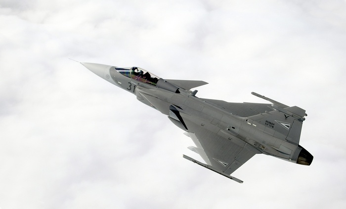 JAS-39 Gripen military jet fighter in the sky