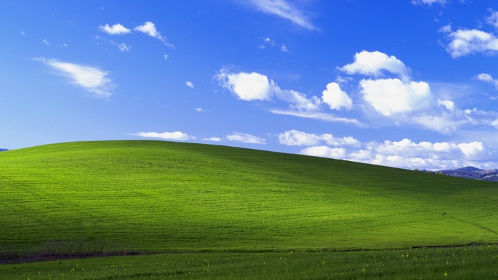 Windows XP Bliss landscape with green hills and blue sky