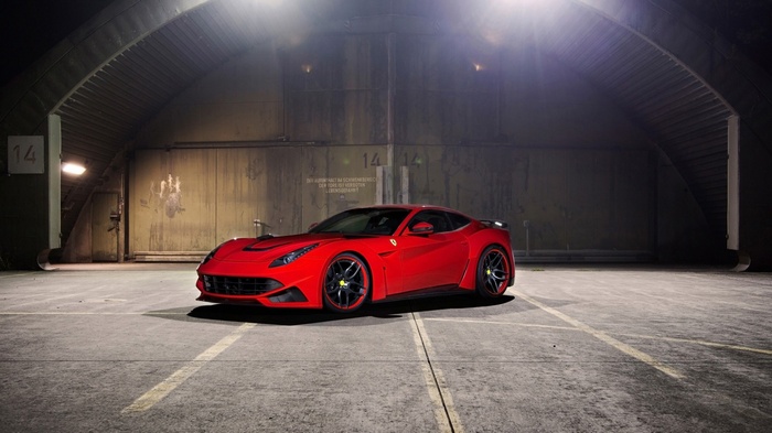 Red Ferrari F12 in a Hangar