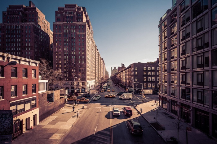 New York City street with traffic and buildings