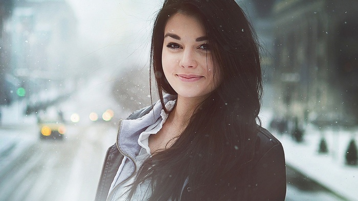 Woman with dark hair in the snow