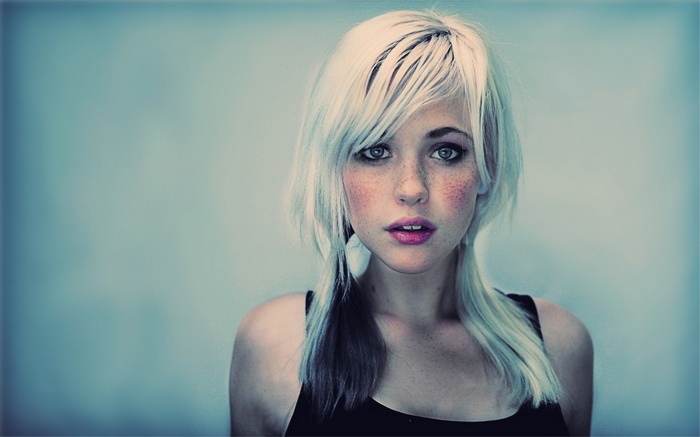Devon Jade with blonde hair and freckles