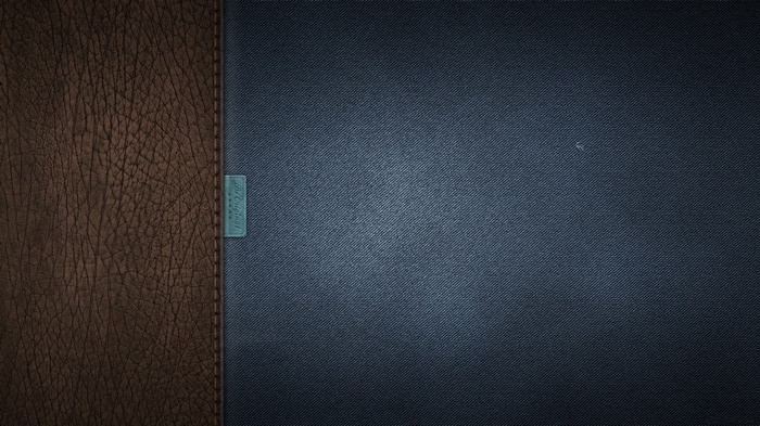 Denim and leather texture with a small tag