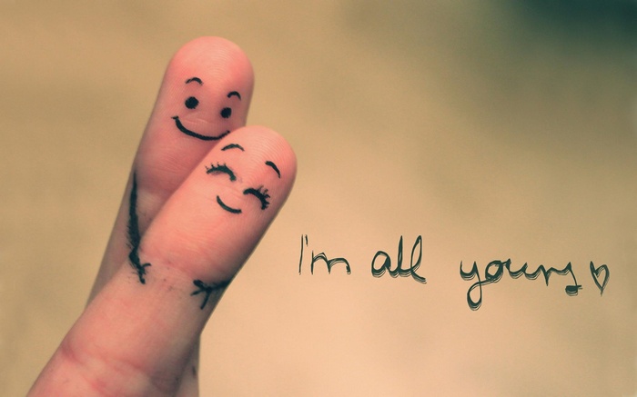 Two fingers with faces drawn on them, saying "I'm all yours"