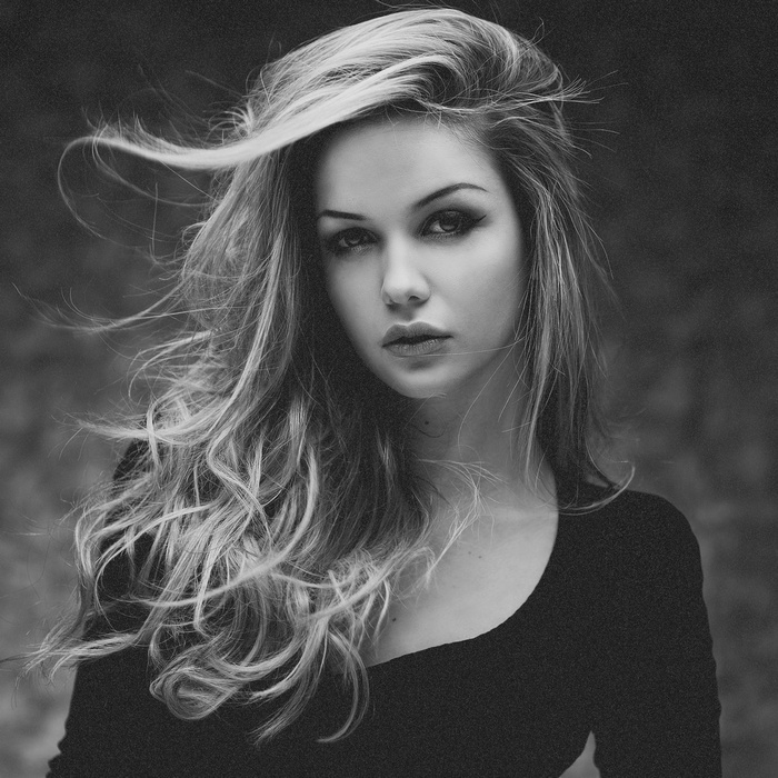 Monochrome portrait of a woman with long hair