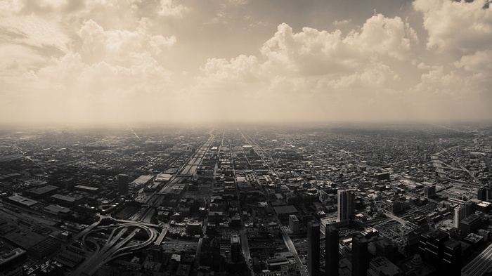 Aerial view of Chicago cityscape with clouds