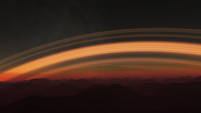 Digital art of planetary rings over a mountainous landscape