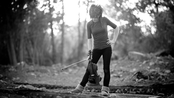 Lindsey Stirling with Violin in Forest