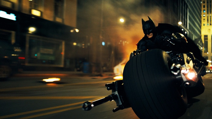 Batman riding the Batpod in The Dark Knight
