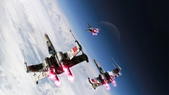 Star Wars X-wings flying over a planet
