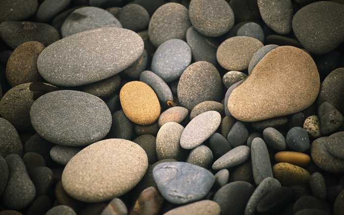A collection of smooth, rounded stones.