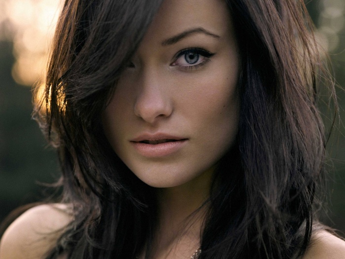 Olivia Wilde portrait with blue eyes and dark hair