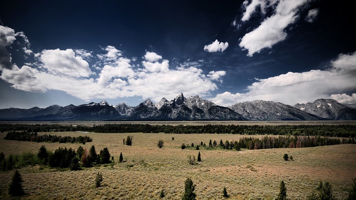 Grand Teton Mountains Landscape with Plains and Clouds