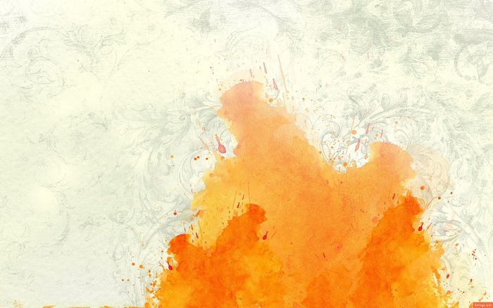 Abstract orange watercolor splashes on a textured background