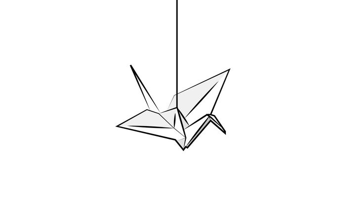 Origami crane hanging on a string