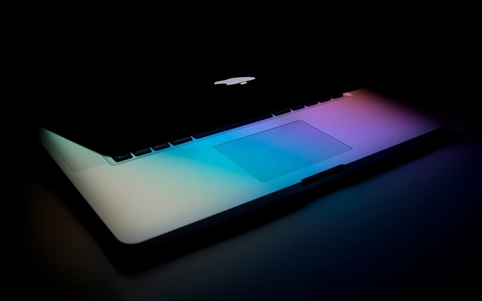 MacBook with colorful lighting