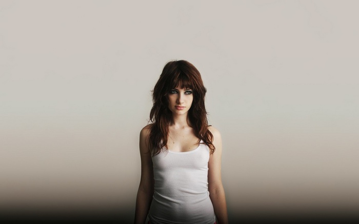 Susan Coffey in a white tank top
