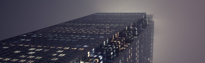 Skyscraper at night in the mist