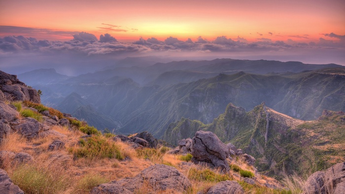 Mountain landscape at sunset with clouds and sky