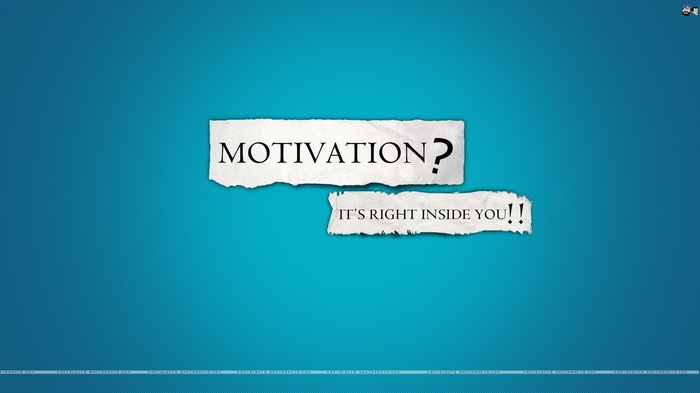 Motivational quote on torn paper