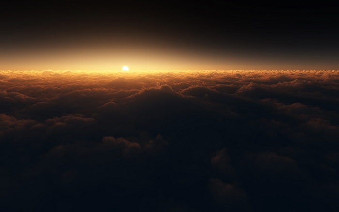 Sun setting over a sea of clouds