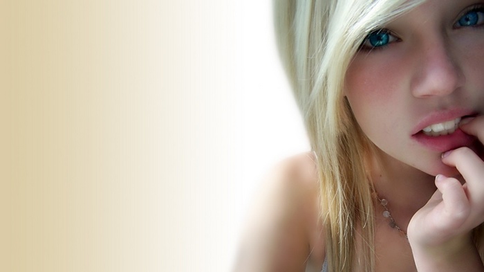 Young woman with blonde hair and blue eyes