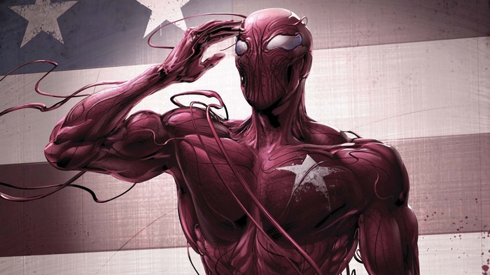 Carnage saluting in front of the American flag