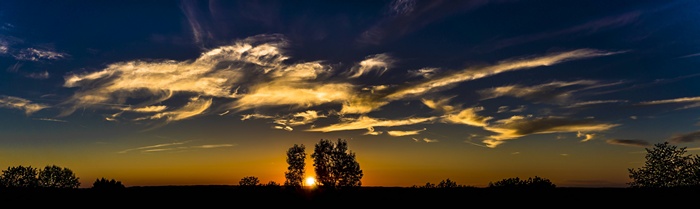 Panorama of the sky at dusk with clouds