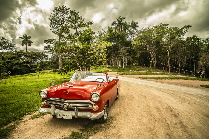 Red classic convertible car in Cuba