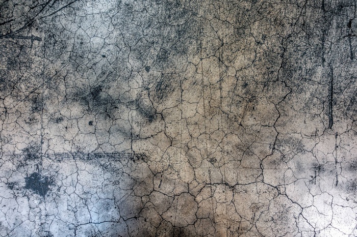 Grunge distressed concrete texture with cracks