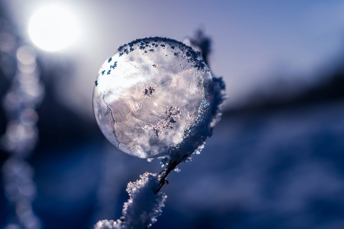 Frozen soap bubble with ice crystals
