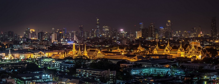 Bangkok skyline at night with Grand Palace illuminated