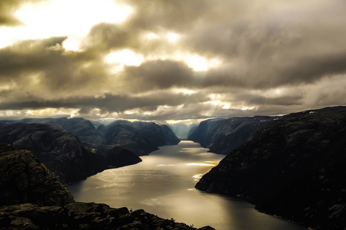 Lysefjord, Norway, with dramatic clouds and sunlight