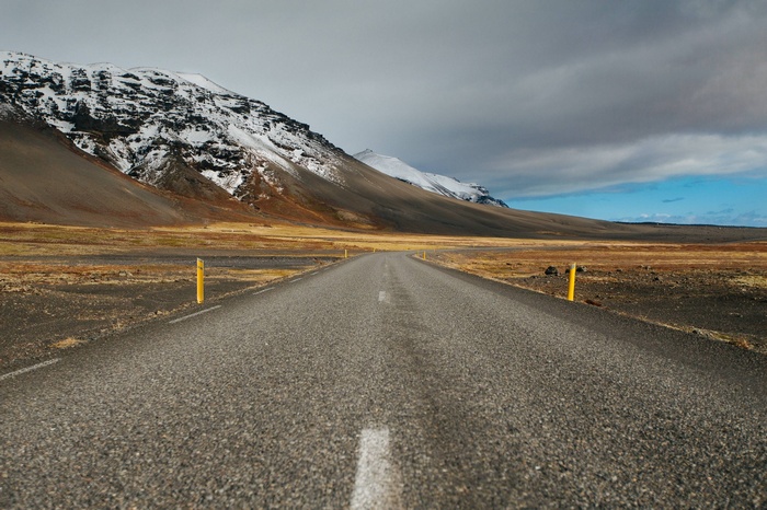 Road through a snowy mountain landscape